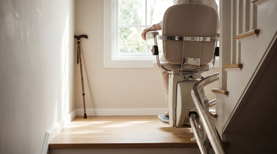 Curved stairlift turning a corner on a staircase